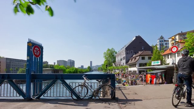sunny day zurich city famous riverside bay bridge panorama 4k timelapse switzerland 
