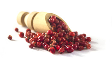 Pink peppercorn isolated on white