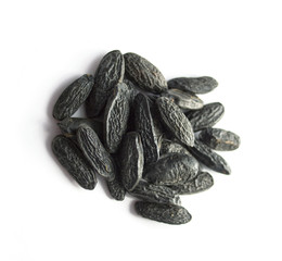 Tonka beans isolated on white