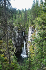 Virgin Komi forests, a waterfall in the rocks.