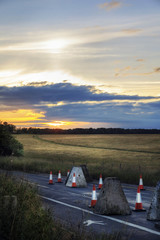 Sunset and  summer Solstice at Stonehenge field