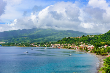 Paradise coast at Saint Pierre with Mt. Pelee, active volcanic mountain in Martinique, Caribbean Sea