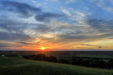 Fototapeta na wymiar Sunrise over field