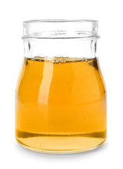 Jar with delicious honey on white background