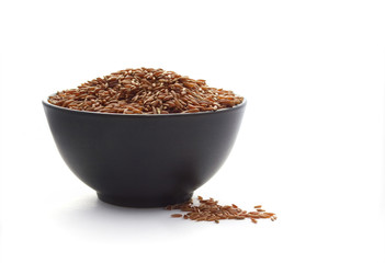 Bowl of red rice isolated on white