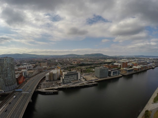 Fototapeta na wymiar aerial view of road, bridge and buildings in Belfast northern Ireland. View on City from above 