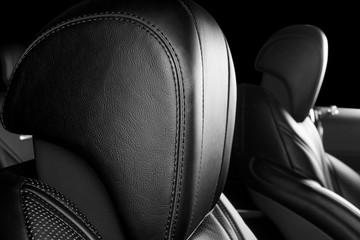 Modern Luxury car inside. Interior of prestige modern car. Comfortable leather seats. Perforated...