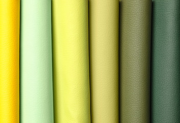 Leather samples of different colors for interior design as background