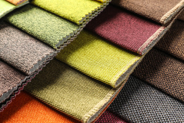 Fabric samples of different colors for interior design as background