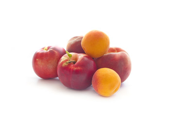 Ripe peaches on white background