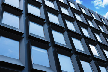 Building with tinted windows, outdoors. Modern architectural design