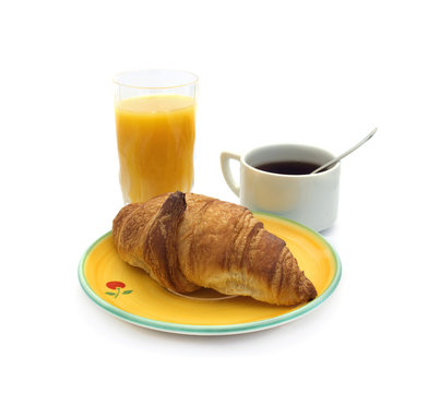 breakfast concept : Croissant, coffee and orange jus