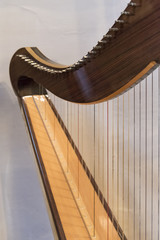 Celtic irish harp, classical and traditional string music instrument, detail.