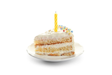 Slice of delicious birthday cake with candle on white background