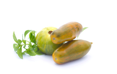 Green and Yellow tomatoes with basil