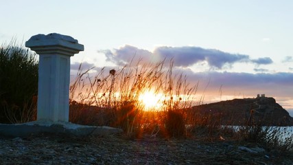Greece Cape Sounion. Single greek column on sea shore and ruins of an ancient temple of Poseidon in the background time lapse 4K - Powered by Adobe