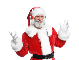 Santa Claus listening to Christmas music on white background