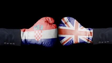 Fototapeta premium Boxing gloves with Croatia and British Union Jack flag. Croatia versus UK concept