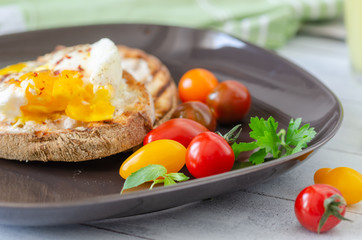 Turkish breakfast on black plate.