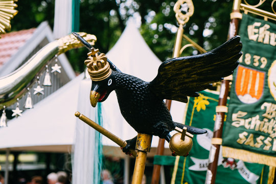 Banner and wooden eagle and other insignia of the mercenaries at the "Schützenfest" in Sassenberg, Germany