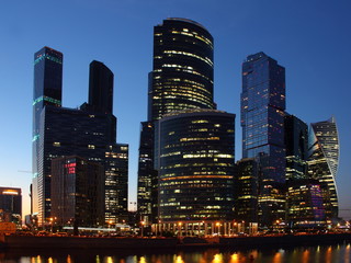 Fototapeta na wymiar Central business center Moscow City - view of the skyscrapers of the Moscow river on the background of the evening downtown, modern architecture of Russia, night summer urban cityscape