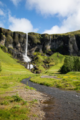 Waterfall along the south coast of Iceland on a summer day