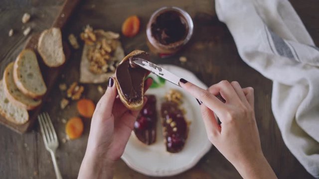 Having breakfast with chocolate bread