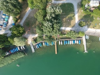 Birdseye view of boats at the lake