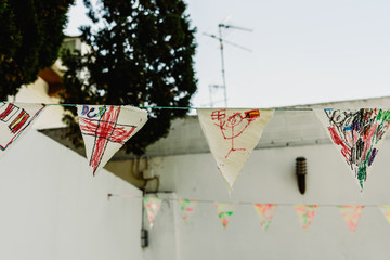 Pennants painted by children to play in summer