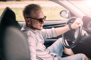 young male business car driver.