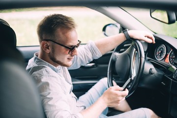 young male business car driver.