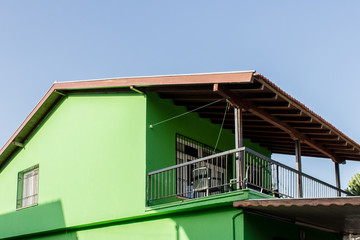 perspective shoot from an green old house