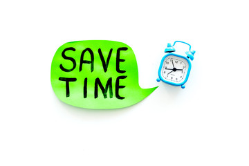 Time-management. Save time hand letterng in cloud near alarm clock on white background top view space for text