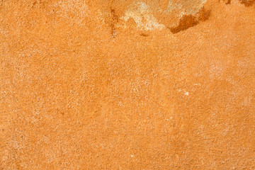 Orange and Cream Colored Textured Stone Wall Background