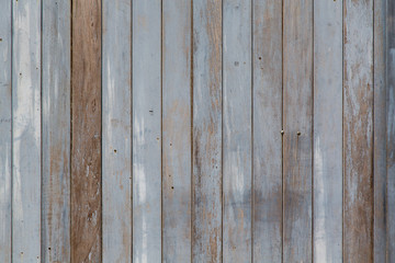 Vertical Wall Planks of Weathered Gray and Brown Wood 