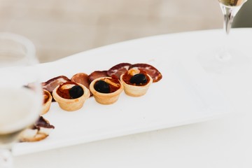 Obraz na płótnie Canvas Appetizers in a Mediterranean wedding, a single-bite snack