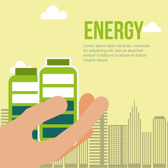 hand holding batteries city energy alternative