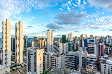 Fototapeta na wymiar Skyline Buildings in a Blue Sky day at Boa Viagem Beach, Recife, Pernambuco, Brazil