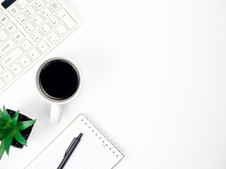 Modern white office desk table with keyboard computer, coffee and other office supplies of necessity, Top view with copy space