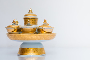 Traditional Thai benjarong ceramic bowls on white background