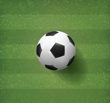 Soccer football ball on green grass field pattern and texture background. Vector.