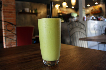 A cup of cold green avocado juice - Indonesian's favorite
