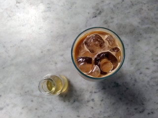 A cup of ice cafe latte served cold