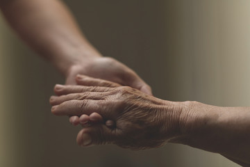 Nurse assistant helping grandmother