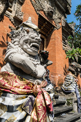 Traditional Balinese Hindu sculpture outside a temple in Ubud, the cultural center of Bali in Indonesia.