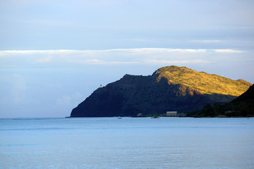 Fototapeta na wymiar Waimanalo bay, Pier, and Makapuu Point with Makapu'u Lighthouse visible