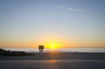 A cool view of the carlsbad beach and the jet streams in the evening sun. 
