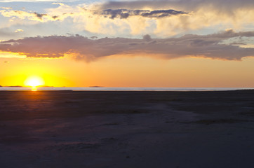 Fototapeta na wymiar A colorful sunset over the waters of the great salt lake in utah. 
