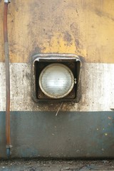 close up old headlight car