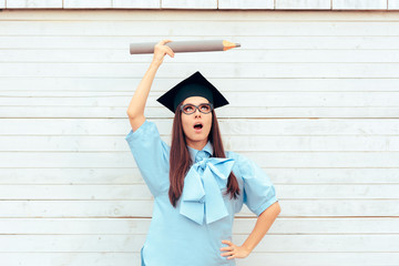 Female Student with Graduation Hat Holding a Big Pencil